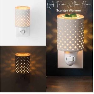 Light from within Scentsy mini plug in warmer white